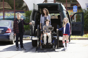 SPEECHLESS - "Pilot" - Maya DiMeo moves her family to a new, upscale school district when she finds the perfect situation for her eldest son, JJ, who has cerebral palsy. While JJ and daughter Dylan are thrilled with the move, middle son Ray is frustrated by the family's tendencies to constantly move, since he feels his needs are second to JJ Soon, Maya realizes it is not the right situation for JJ and attempts to uproot the family again. But JJ connects with Kenneth, the school's groundskeeper, and asks him to step in as a his caregiver, and Ray manages to convince Maya to give the school another chance, on the series premiere "Speechless" WEDNESDAY, SEPTEMBER 21 (8:30-9:00 p.m. EDT), on the ABC Television Network. (ABC/Nicole Wilder) JOHN ROSS BOWIE, MINNIE DRIVER, MICAH FOWLER, KYLA KENEDY